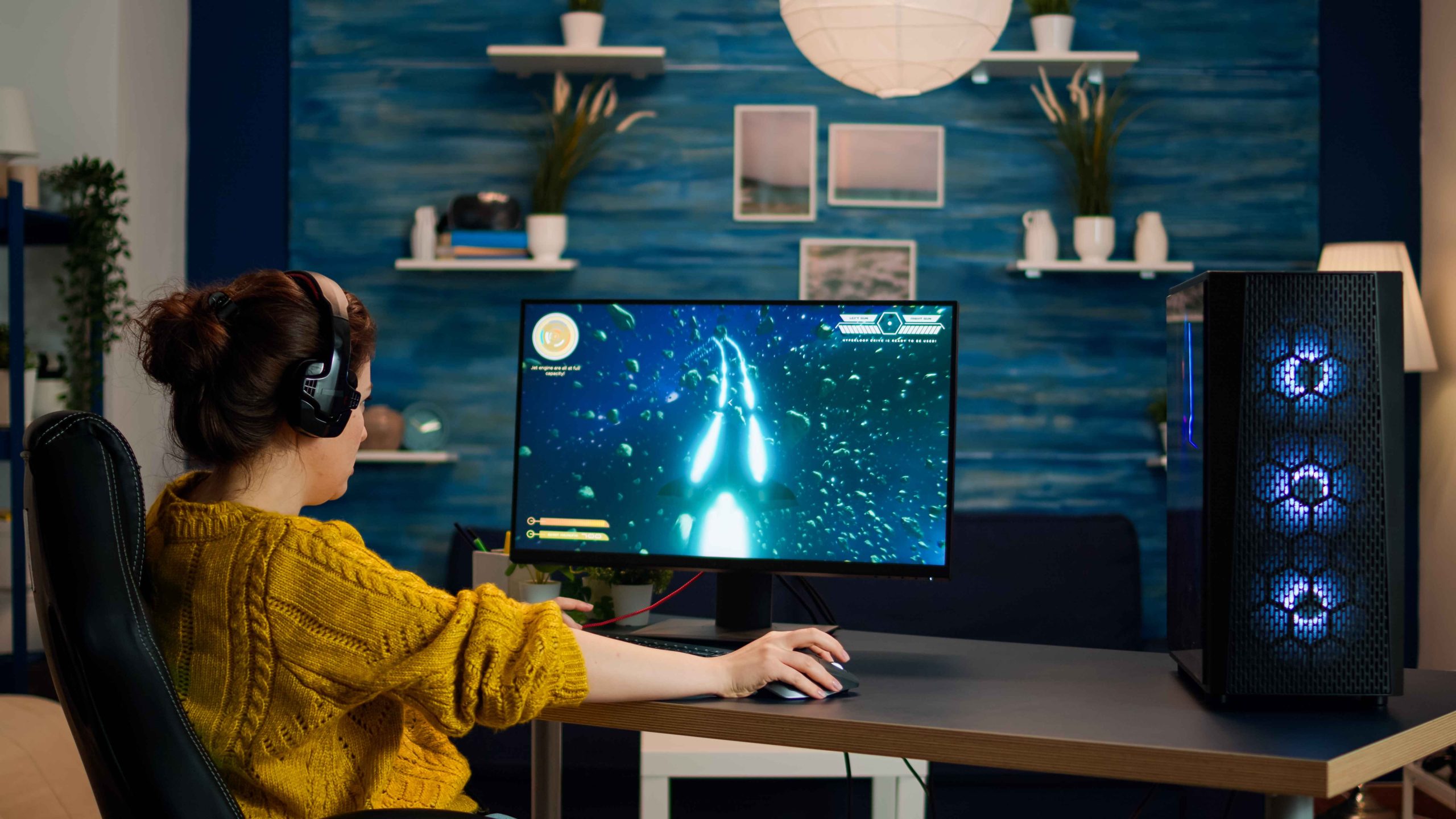 a girl playing game in pc